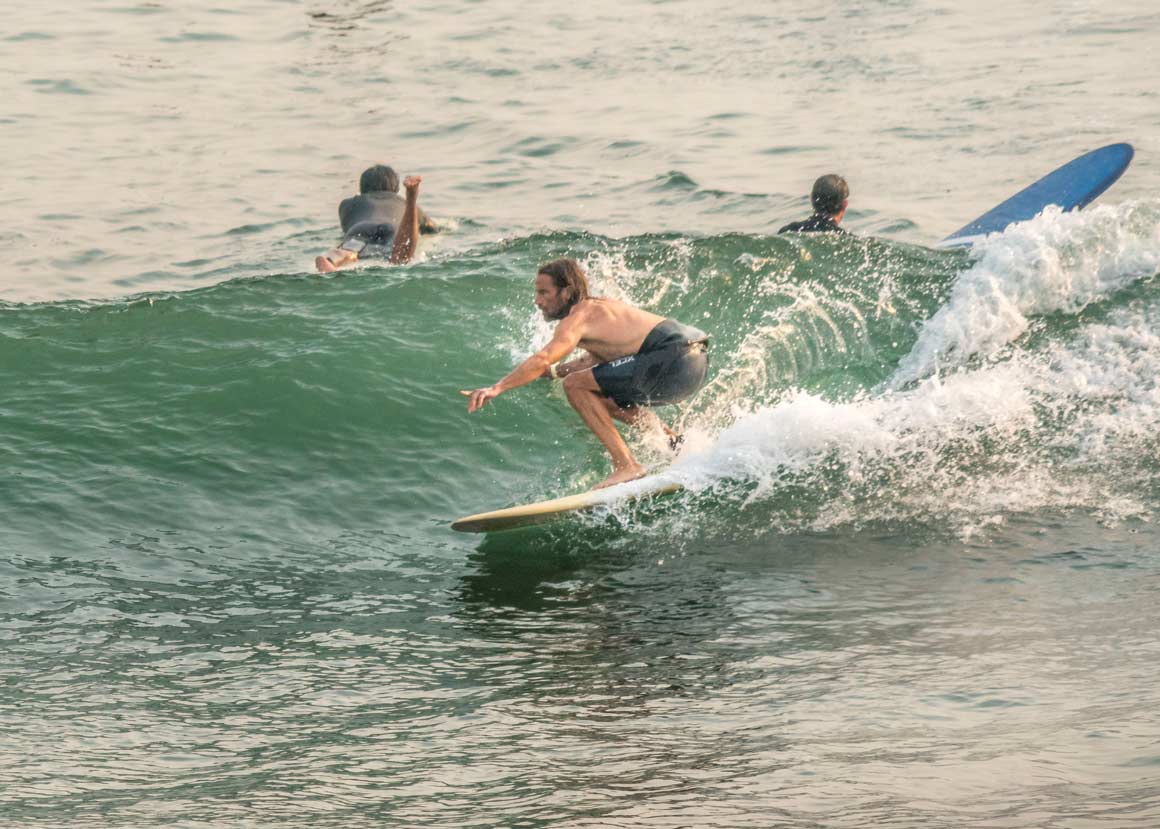 Josh surfing
